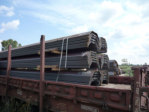 Delivery of virgin material from the rolling mill by train, pile sheets and U-profiles