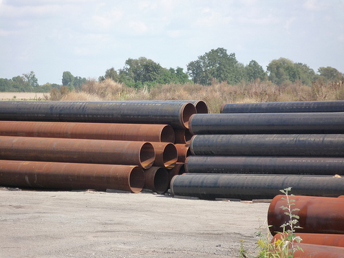 Pipe depot, large steel pipes, virgin material, IIA material